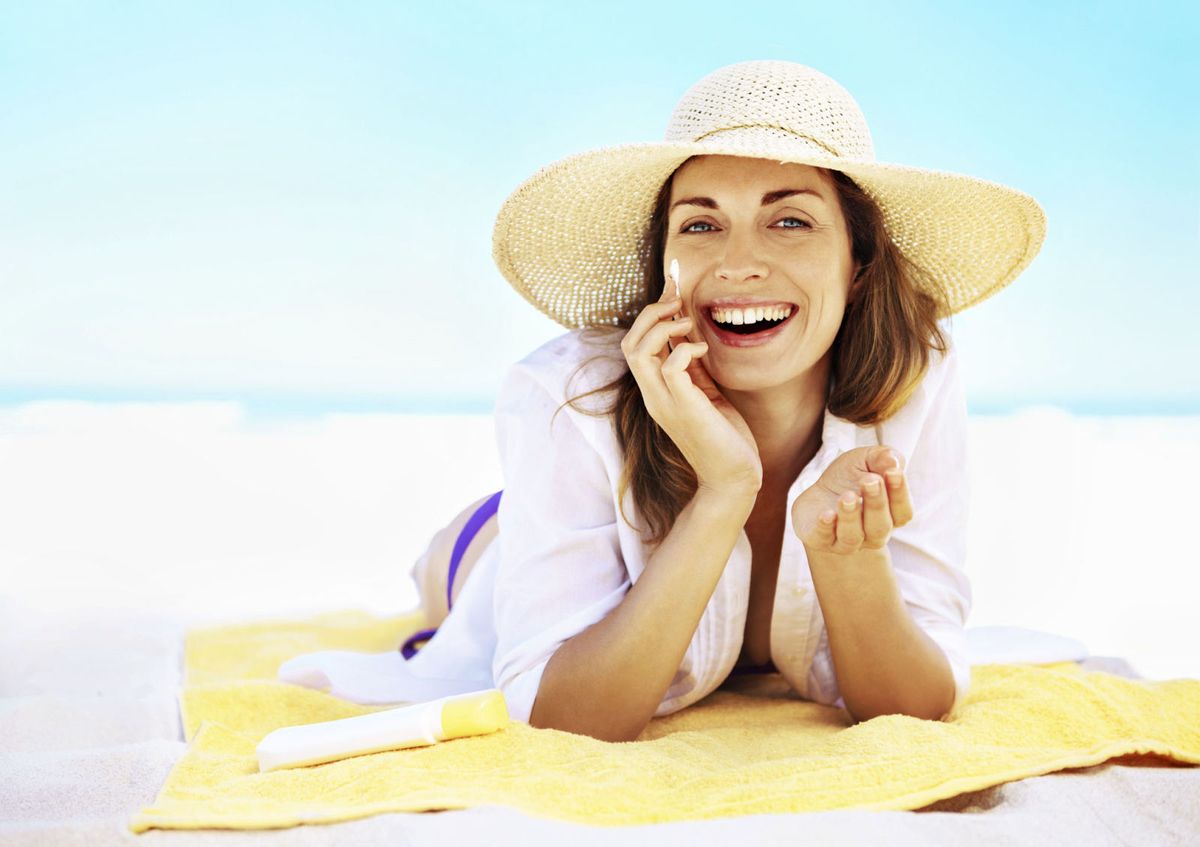 Hat, Skin, Human body, Happy, People in nature, Facial expression, Headgear, Fashion accessory, Sitting, Sun hat, 