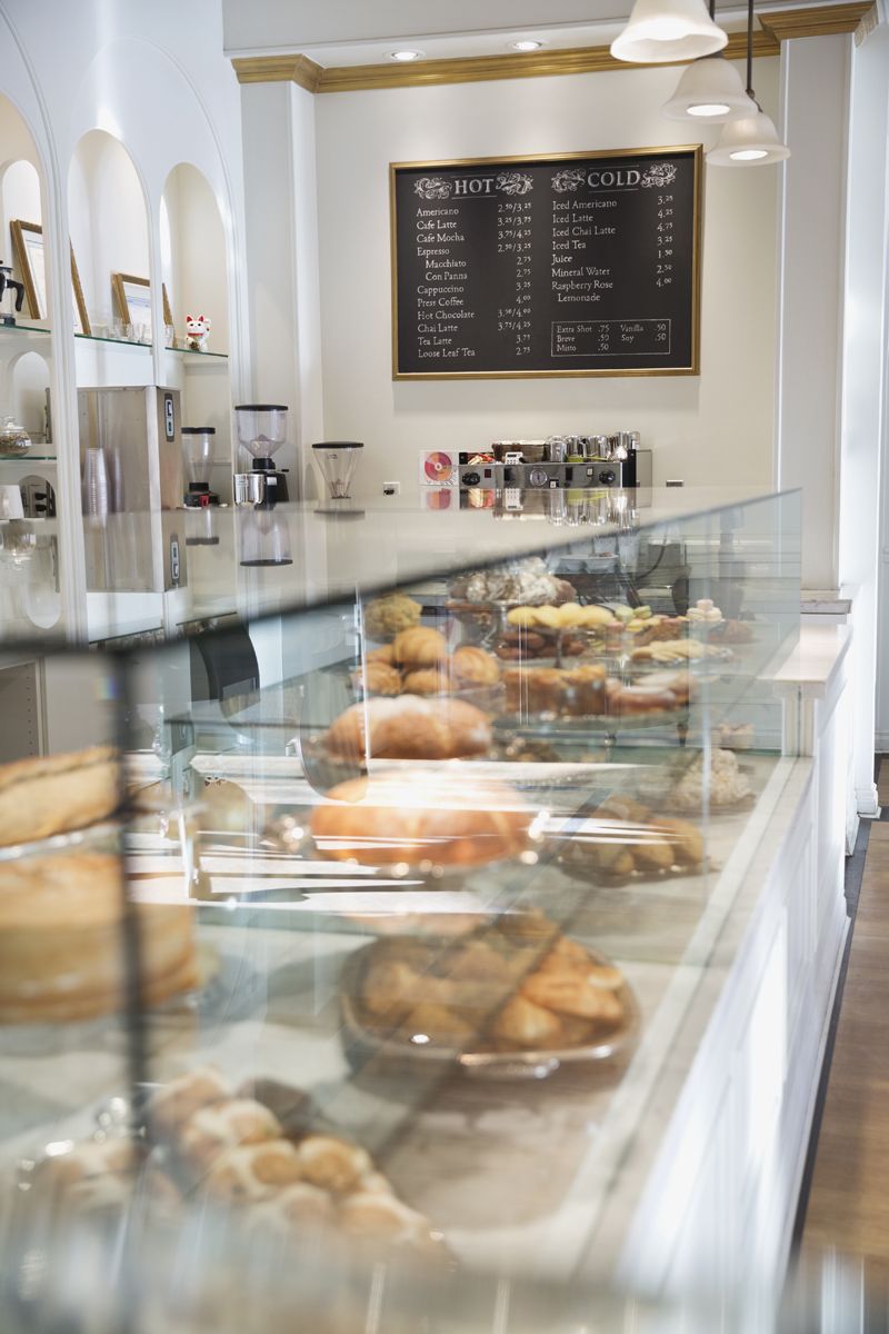 fall date ideas counter with baked goods and pastries at a coffee shop