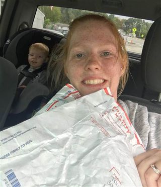 Crystal and her son picking up the blankets. Look how happy Parker is!