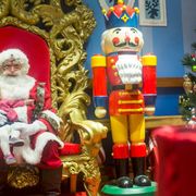 Event, Santa claus, Red, Interior design, Christmas decoration, Holiday, Interior design, Christmas, Fictional character, Toy, 