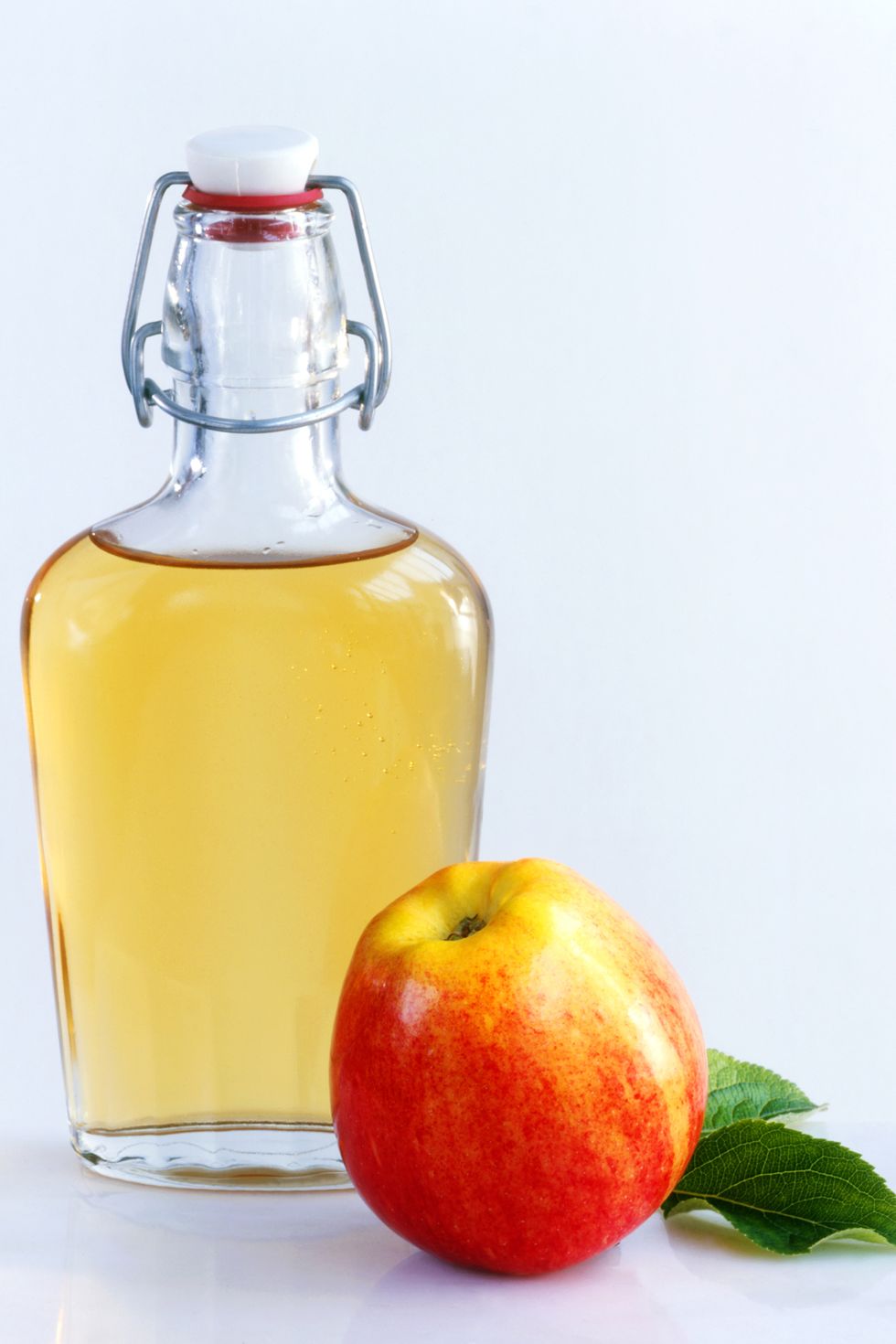 natural hair treatment bottle of apple cider vinegar