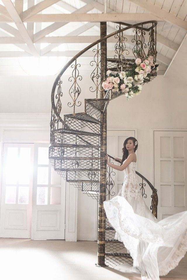 White, Clothing, Dress, Wedding dress, Stairs, Bride, Gown, Room, Bridal clothing, Shoulder, 