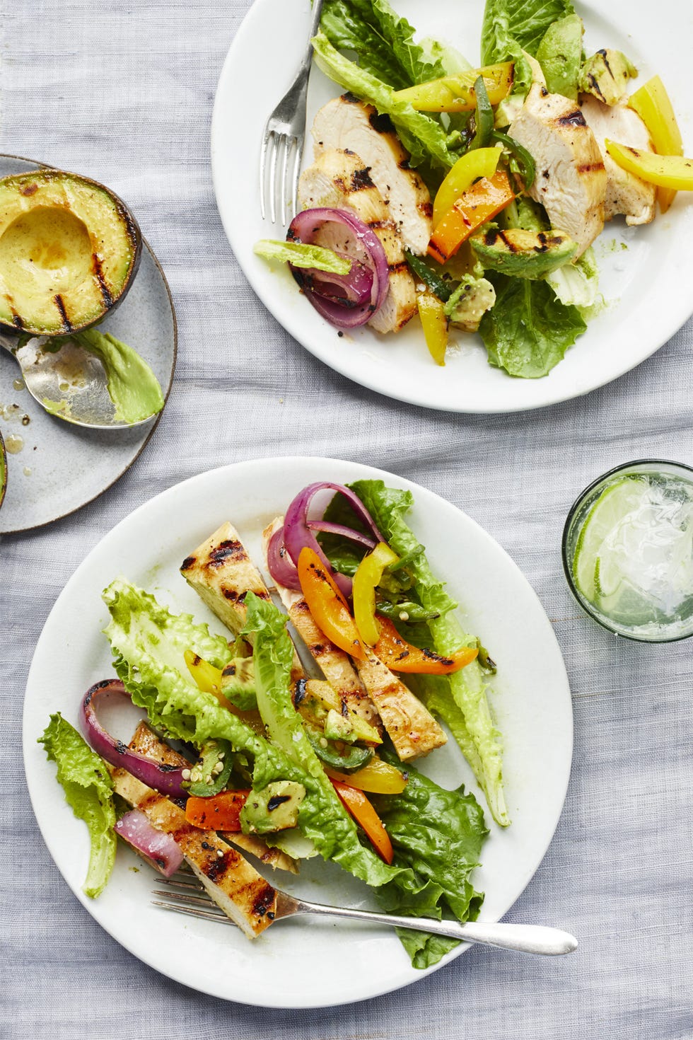 grilling recipes two plates of chicken fajita salad with lime cilantro vinaigrette