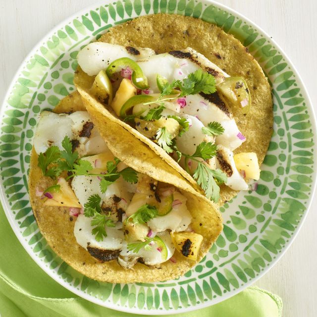 heart healthy recipes two grilled fish tacos on a plate