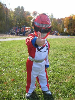 Red, Costume, Child, Grass, Toddler, Fictional character, Games, 