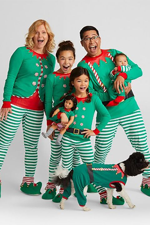 Green, Pajamas, People, Christmas, Holiday, Fictional character, Fun, Family taking photos together, Nightwear, Event, 