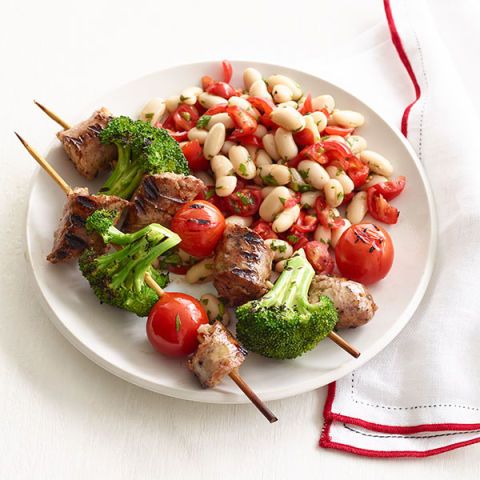 sausage kebabs with broccoli tomatoes and white bean salad