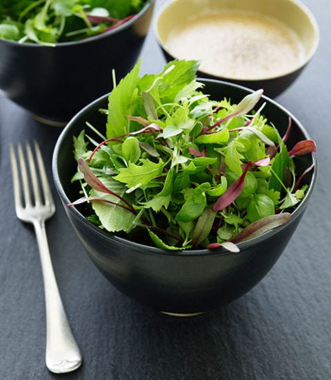 4. Sprinkle walnuts on a salad. bowl of salad