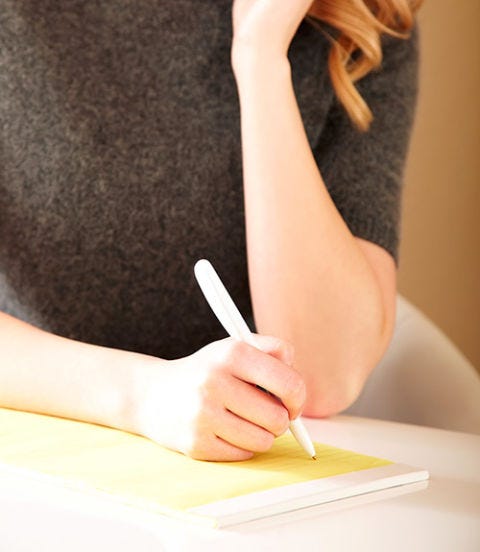 1. Make a “reasons why” list for tough decisions. woman writing a list