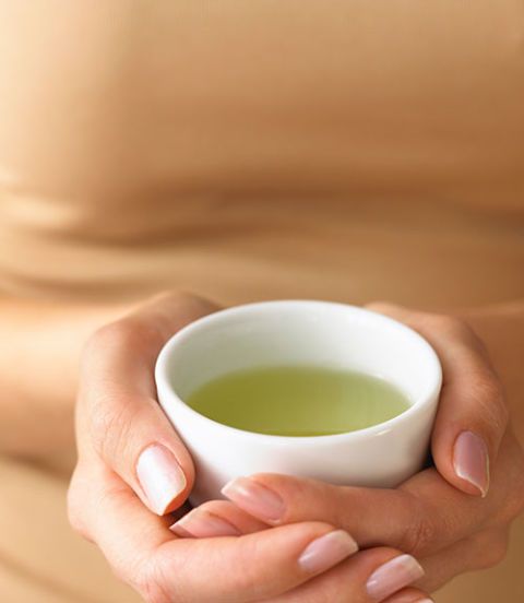 woman drinking green tea