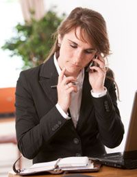 Finger, Hairstyle, Chin, Forehead, Sitting, Table, Collar, Formal wear, Wrist, White-collar worker, 