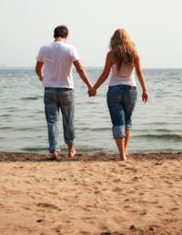 Body of water, Leg, Fun, People on beach, Human body, Coastal and oceanic landforms, Standing, Photograph, Sand, People in nature, 