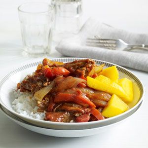 Slow-Cooker-Braised-Flank-Steak-with-Peppers-Onions-Recipe