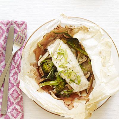 asian fish in parchment with mushrooms and broccoli