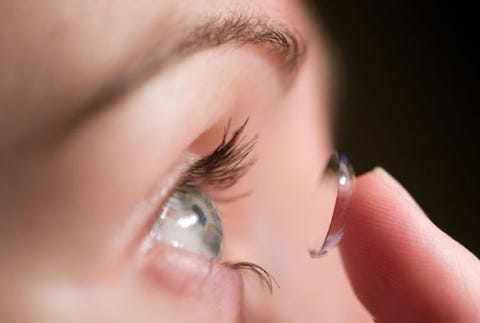 1. Use Your Contacts Properly woman putting in contacts