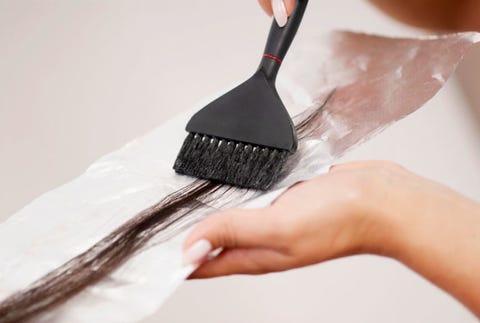 2. Go ombre with your hair. woman dyeing hair at the salon