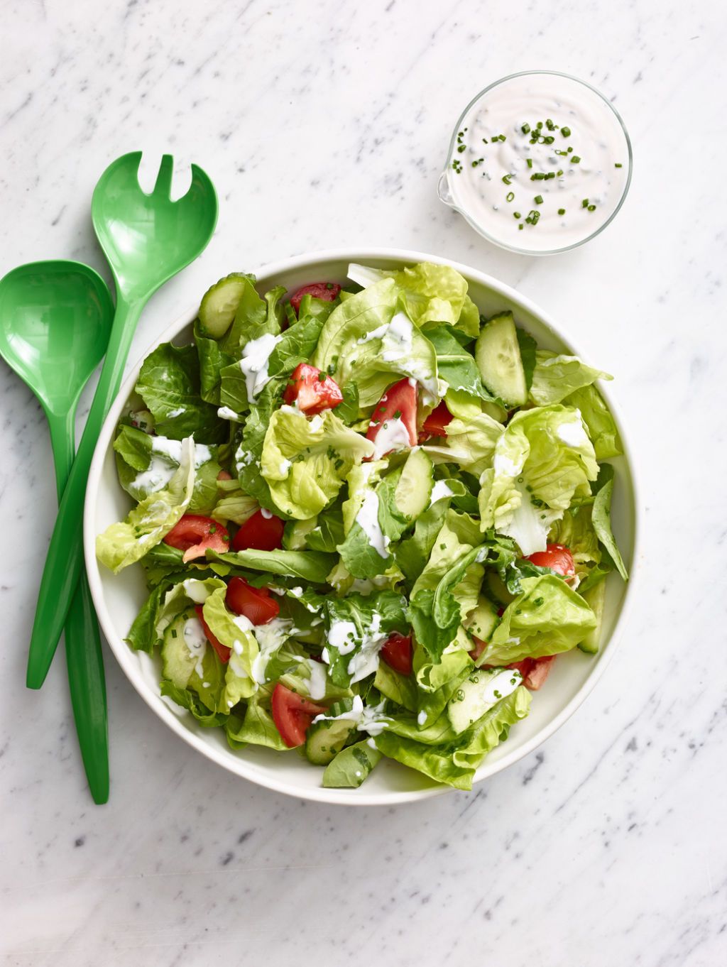 <p>You can make this dressing up to 3 days ahead!  Refrigerate the dressing without the chives. A day ahead, prep the lettuce and cucumbers and refrigerate separately. Just before serving, cut the tomatoes and stir in the chives. </p> <p><strong>Recipe:</strong> <a href="salad-creamy-ranch-dressing-wdy0315" target="_blank"><strong>Salad with Creamy Ranch Dressing</strong></a></p>