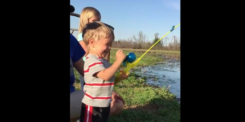 Little Boy Catches Huge Fish with Toy Rod 
